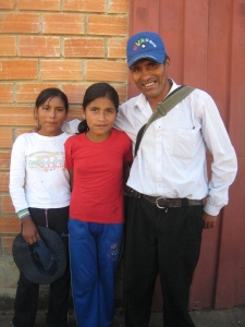 Genero Ramos with two of his daughters, Rebecca (12) and Noemi (11)